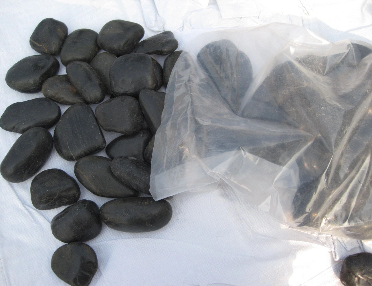 black polished garden pebbles