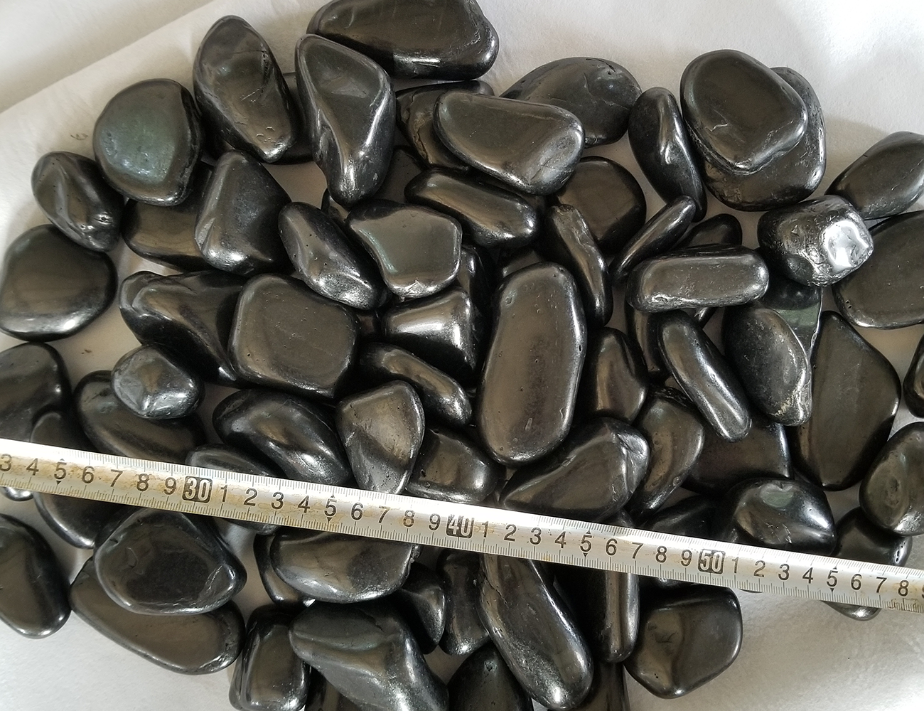 black polished pebbles