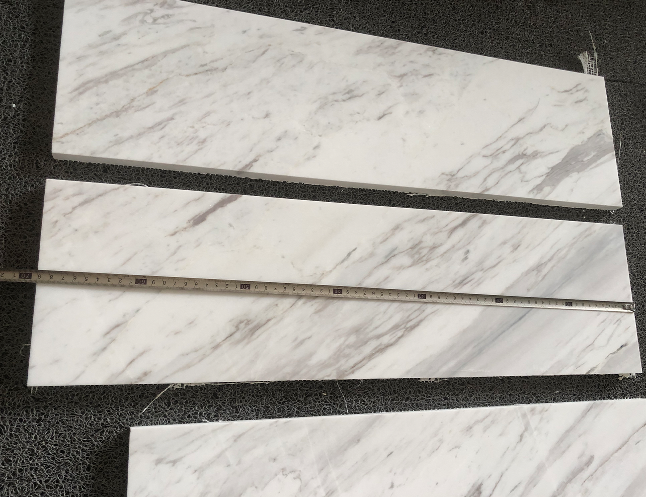 white volakas marble tile