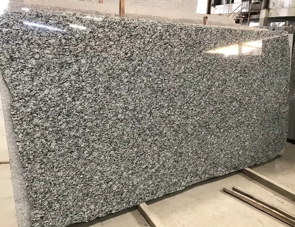 white wave granite countertop