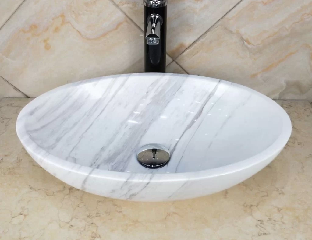 white marble wash basin